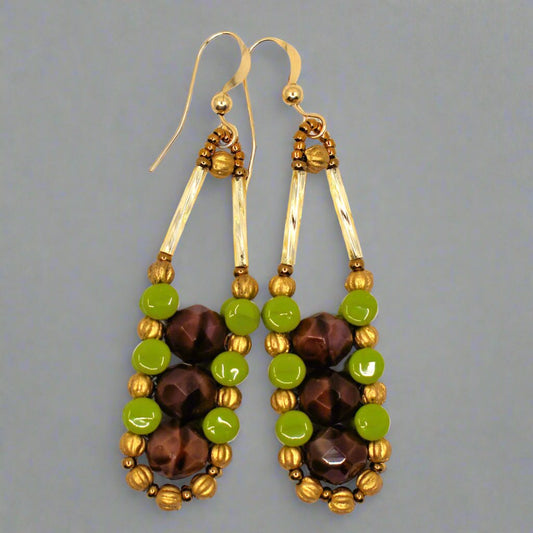 Silky brown and avocado green earrings with gold accents and earwires. These have three silk-swirled brown beads in a column, outlined in green and gold beads.