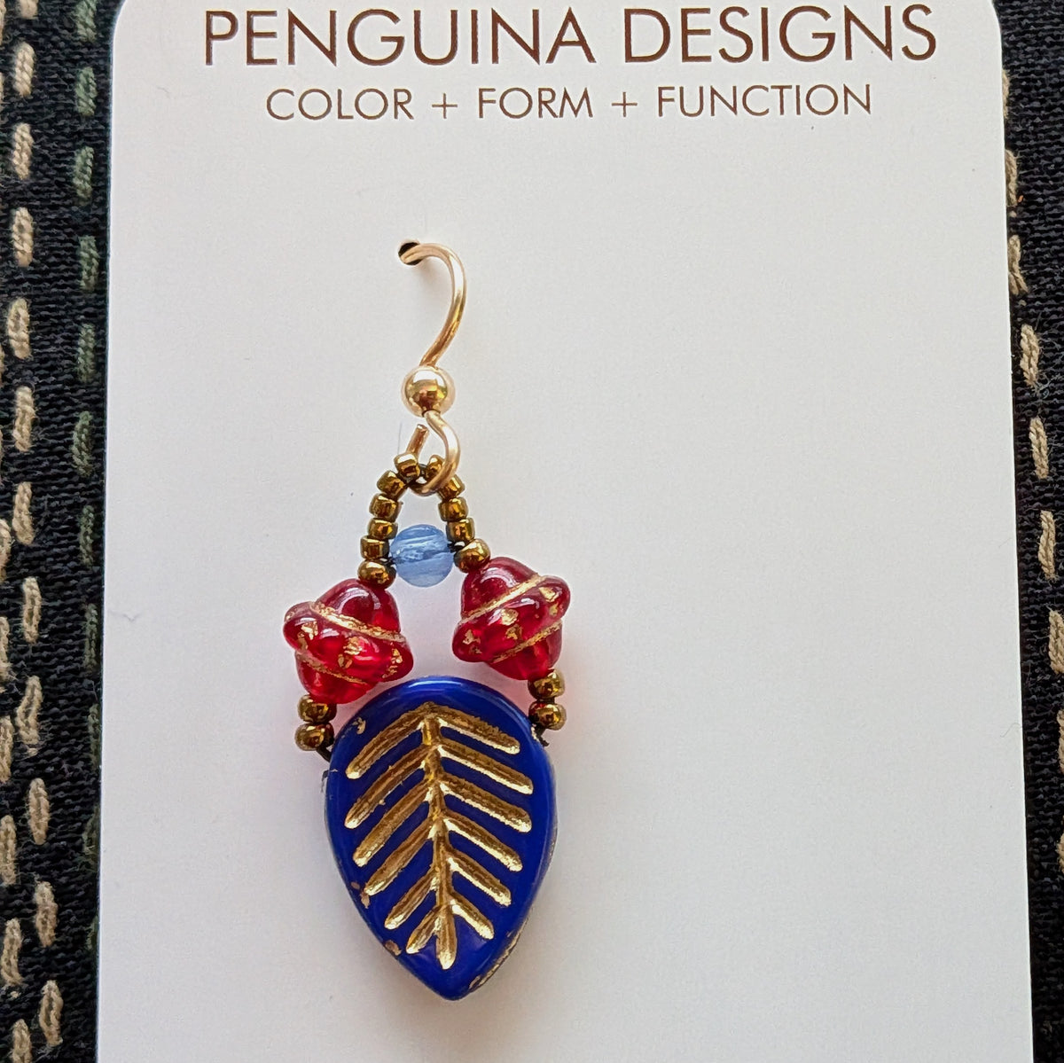 Blue leaf with red and gold on  gold earring wire