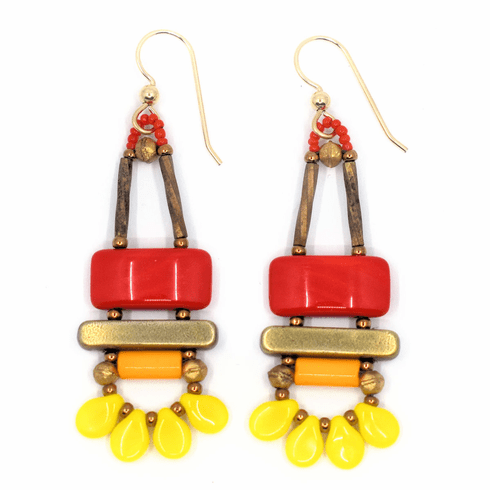 Bright red, orange, and yellow earrings with gold ear wires lay on a white background. These earrings have a warm red rectangle on top of a gold bar. Below the bar is a light orange tube and then a swag of four bright yellow petals separated by gold seed beads.