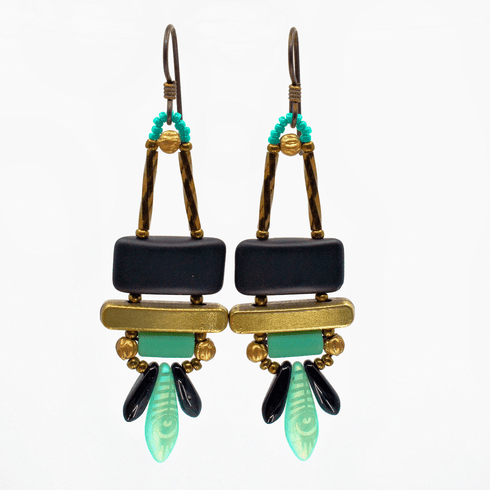 Black and light turquoise earrings with gold accents and dark ear wires against a white background. The earrings have a matte black rectangle above a gold bar. Below the bar is a seafoam turquoise bar, ant at the bottom, two small, glossy black daggers sandwich a turquoise dagger with a peacock feather design.