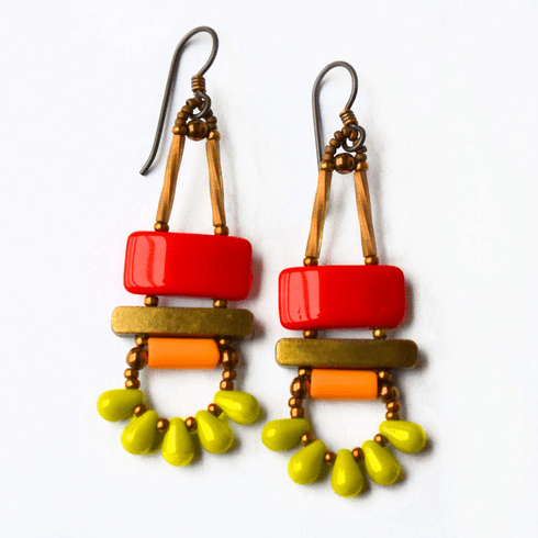 Red, orange and lime green earrings with gold accents and dark ear wires. These earrings have a red rectangle stacked on top of gold bars. Below the bar is a light orange tube. At the bottom is a swag of five small lime green teardrops. 